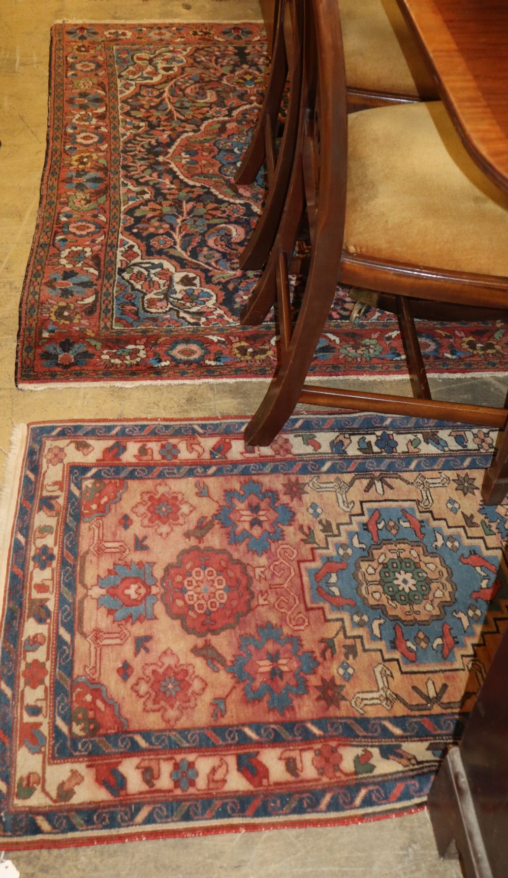 Two Eastern red ground rugs, larger 152 x 105cm